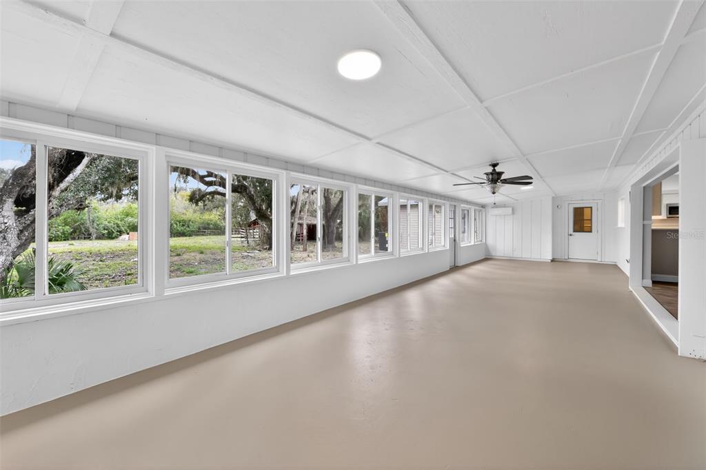 4570 Hidden River Road Sarasota, FL 34240 - Photo 43 of 45 a view of an empty room with a window