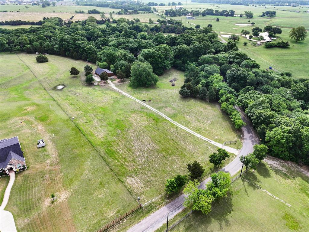 1906 Durning Road Van Alstyne, TX 75495 - Photo 18 of 40 a view of a basket ball ground and large trees