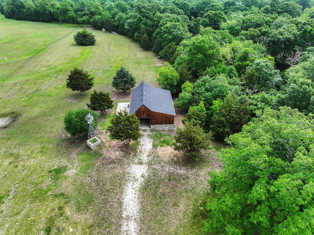 1906 Durning Road Van Alstyne, TX 75495 - Photo 3 of 40 an aerial view of a house with pool and garden