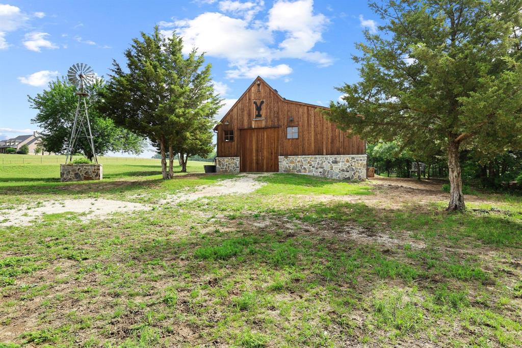 1906 Durning Road Van Alstyne, TX 75495 - Photo 5 of 40 a view of a house with a yard
