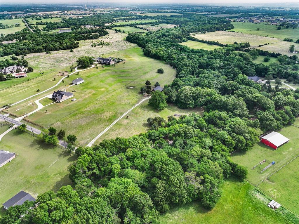 1906 Durning Road Van Alstyne, TX 75495 - Photo 9 of 40 an aerial view of residential houses with outdoor space and trees
