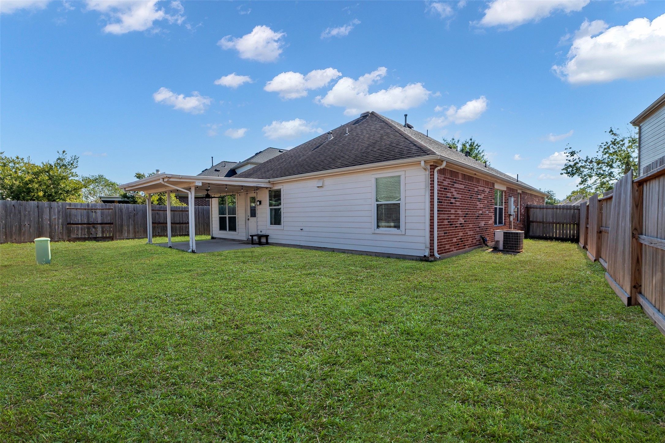 30303 Castle Forest Drive Spring, TX 77386 - Photo 23 of 41 a view of a house with backyard and garden