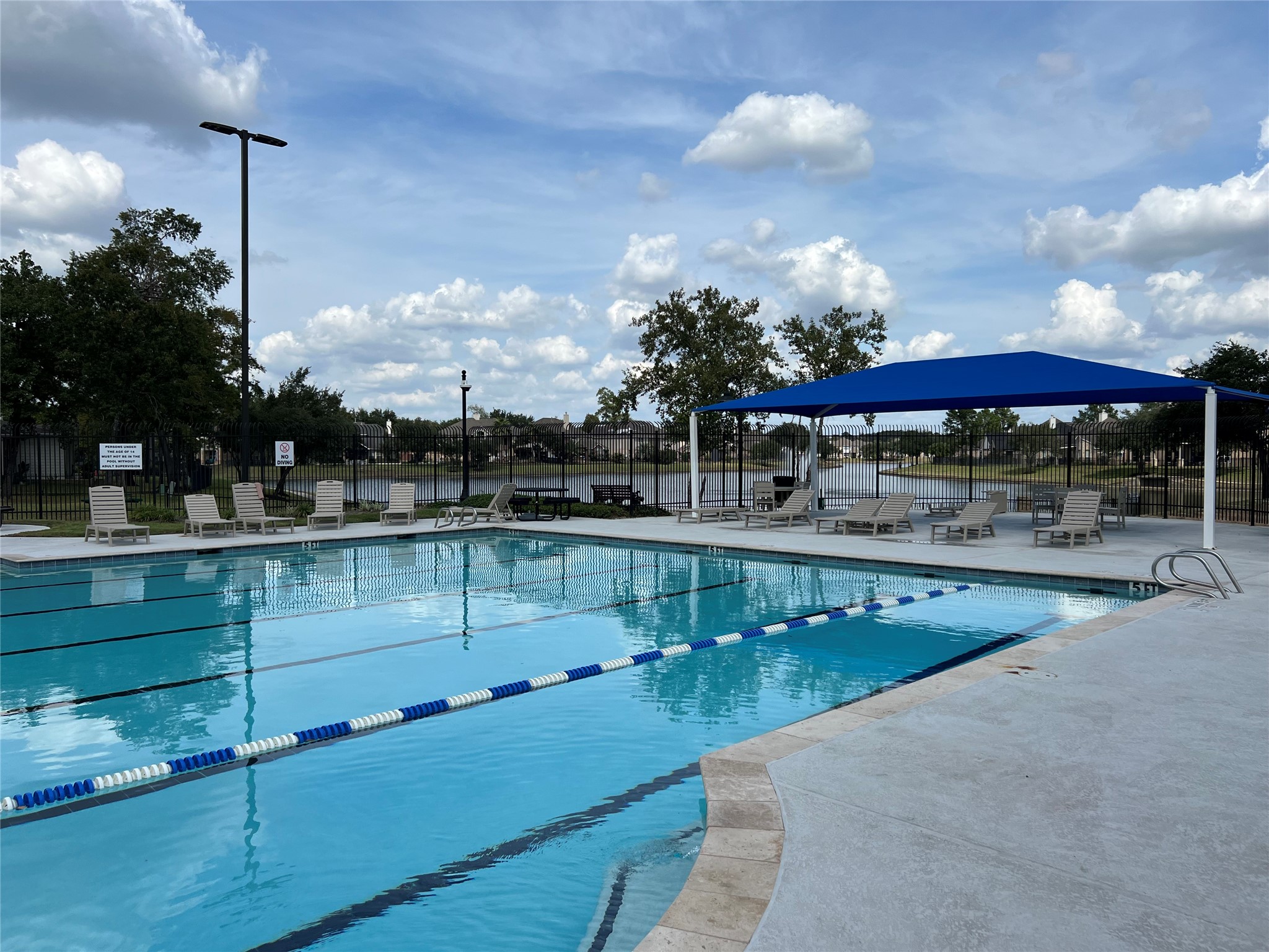 30303 Castle Forest Drive Spring, TX 77386 - Photo 29 of 41 Junior Olympic size lap pool at front of neighborhood.