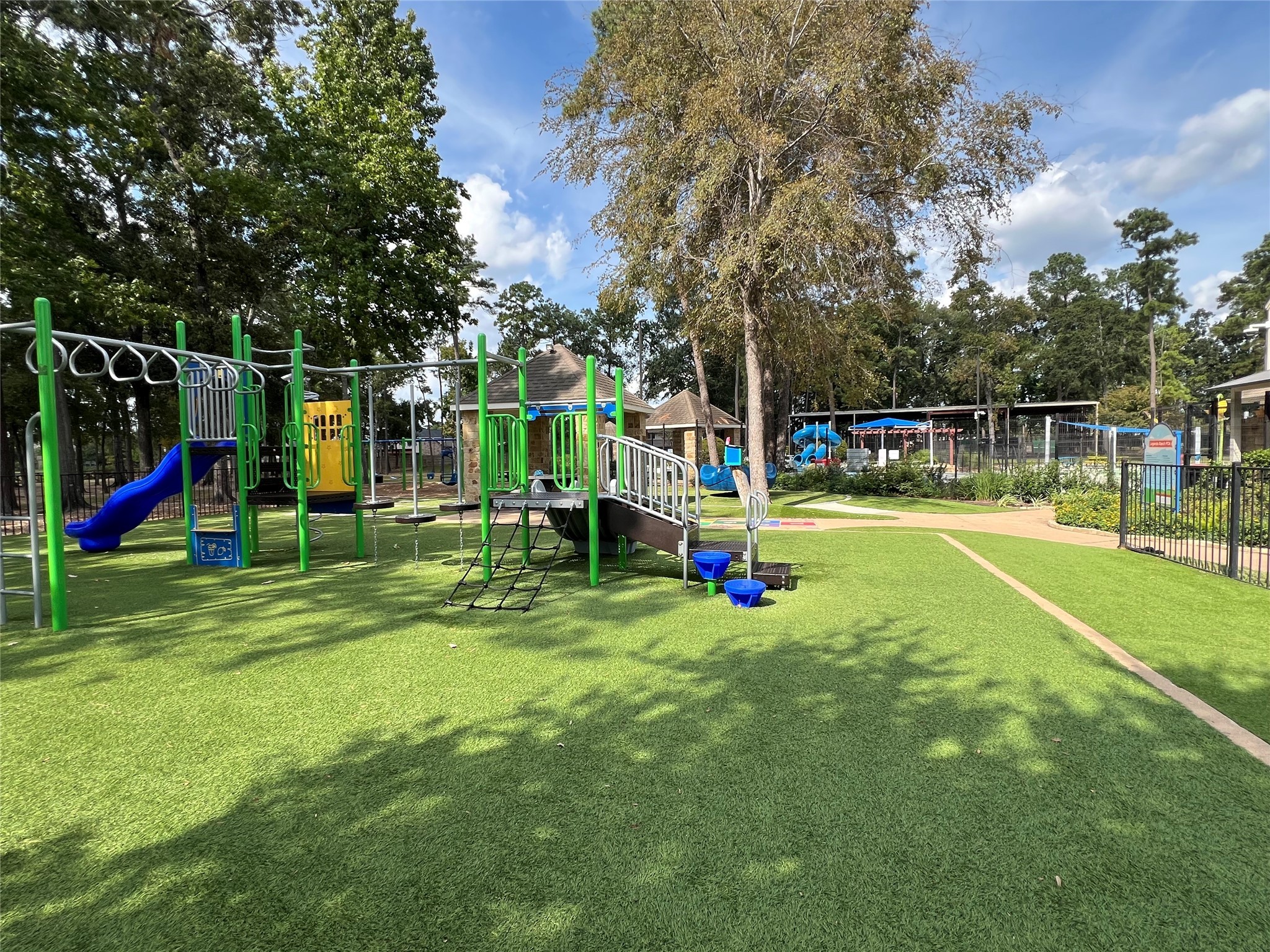 30303 Castle Forest Drive Spring, TX 77386 - Photo 33 of 41 a view of a park with swings