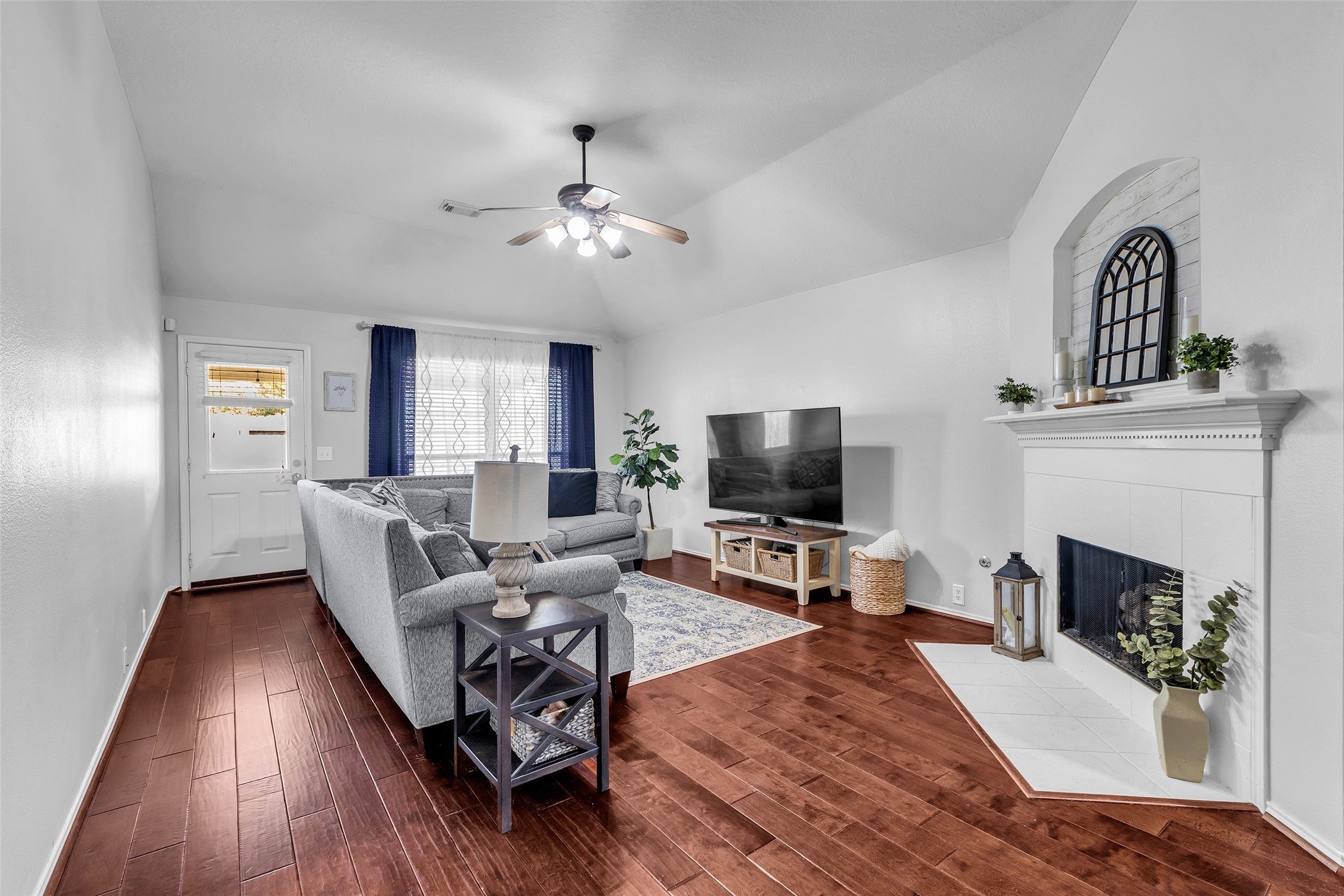 30303 Castle Forest Drive Spring, TX 77386 - Photo 6 of 41 a living room with furniture fireplace and flat screen tv