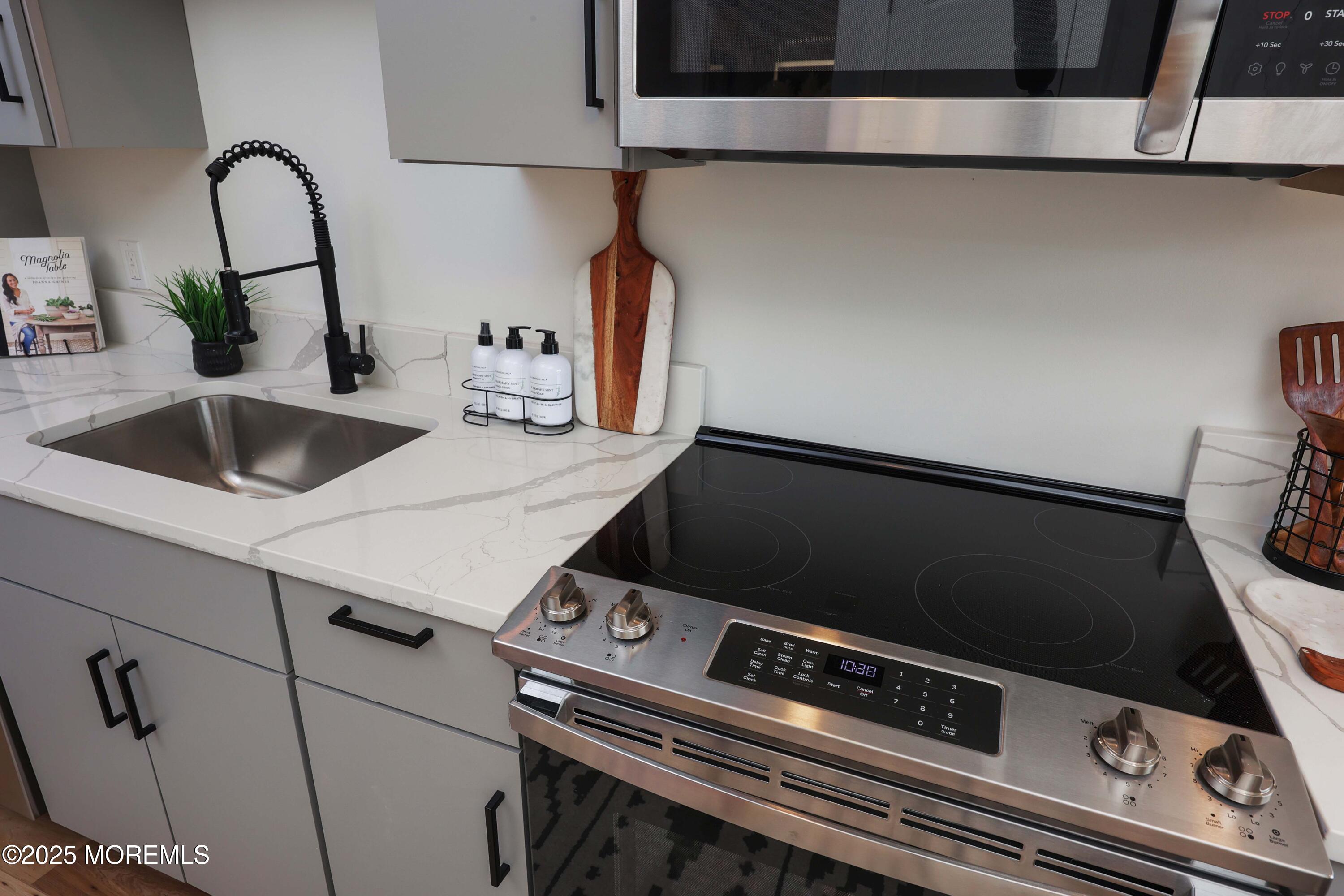 179 Chelsea Avenue, Unit 304 Long Branch, NJ 07740 - Photo 4 of 13 a close view of sink and tap