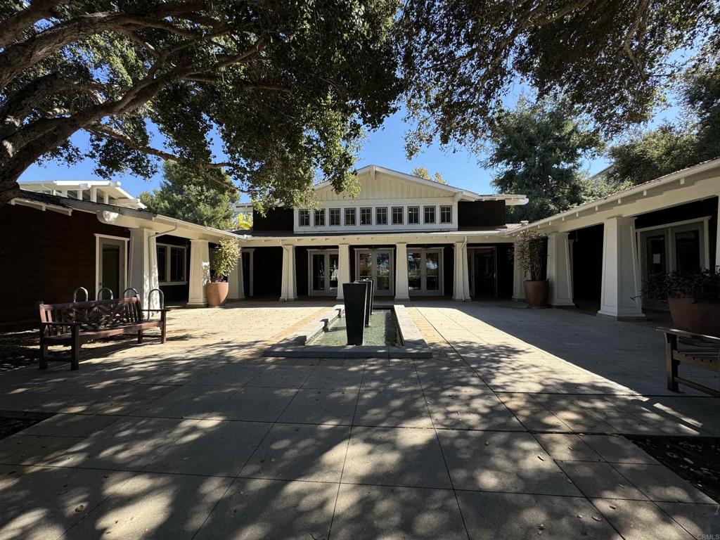 7618 Circulo Sequoia Carlsbad, CA 92009 - Photo 39 of 45 a front view of a house with a yard