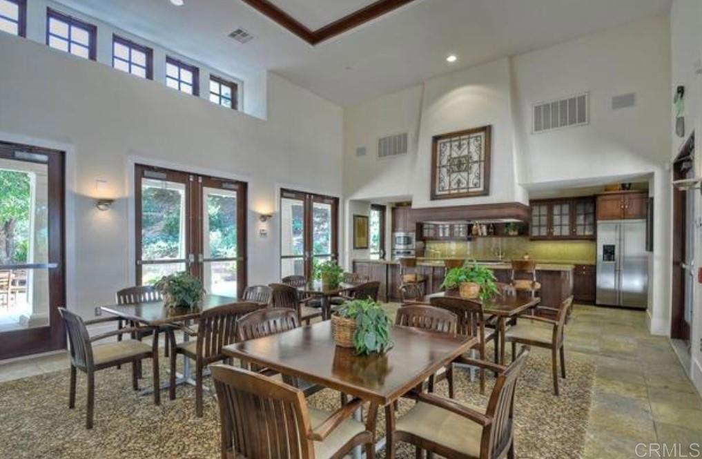 7618 Circulo Sequoia Carlsbad, CA 92009 - Photo 40 of 45 a view of a dining room with furniture window and outside view