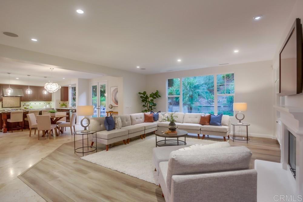 7618 Circulo Sequoia Carlsbad, CA 92009 - Photo 10 of 45 a living room with furniture and a large window