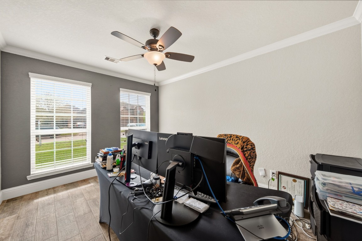 29446 Ridge Clearing Trail Spring, TX 77386 - Photo 7 of 28 a view of a workspace with furniture and a window