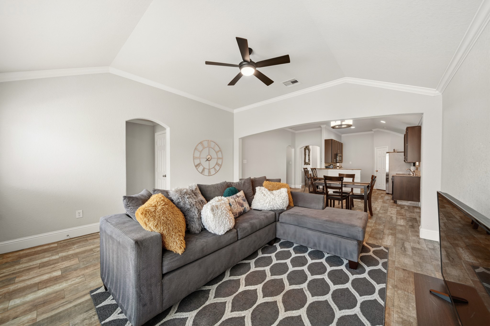29446 Ridge Clearing Trail Spring, TX 77386 - Photo 9 of 28 Comfortable living room that flows seamlessly into the kitchen and dining areas.