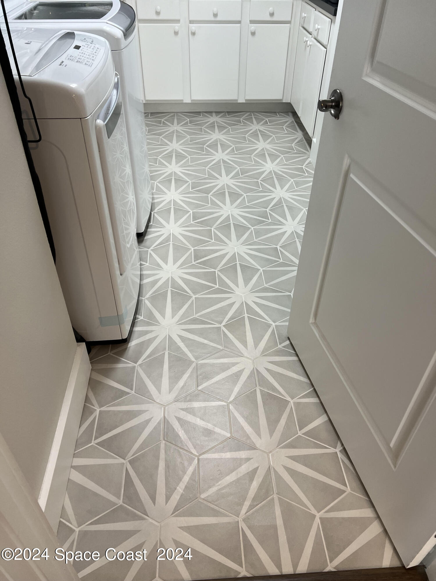 29 Riverside Drive, Unit 201 Cocoa, FL 32922 - Photo 12 of 46 Laundry Room Floor