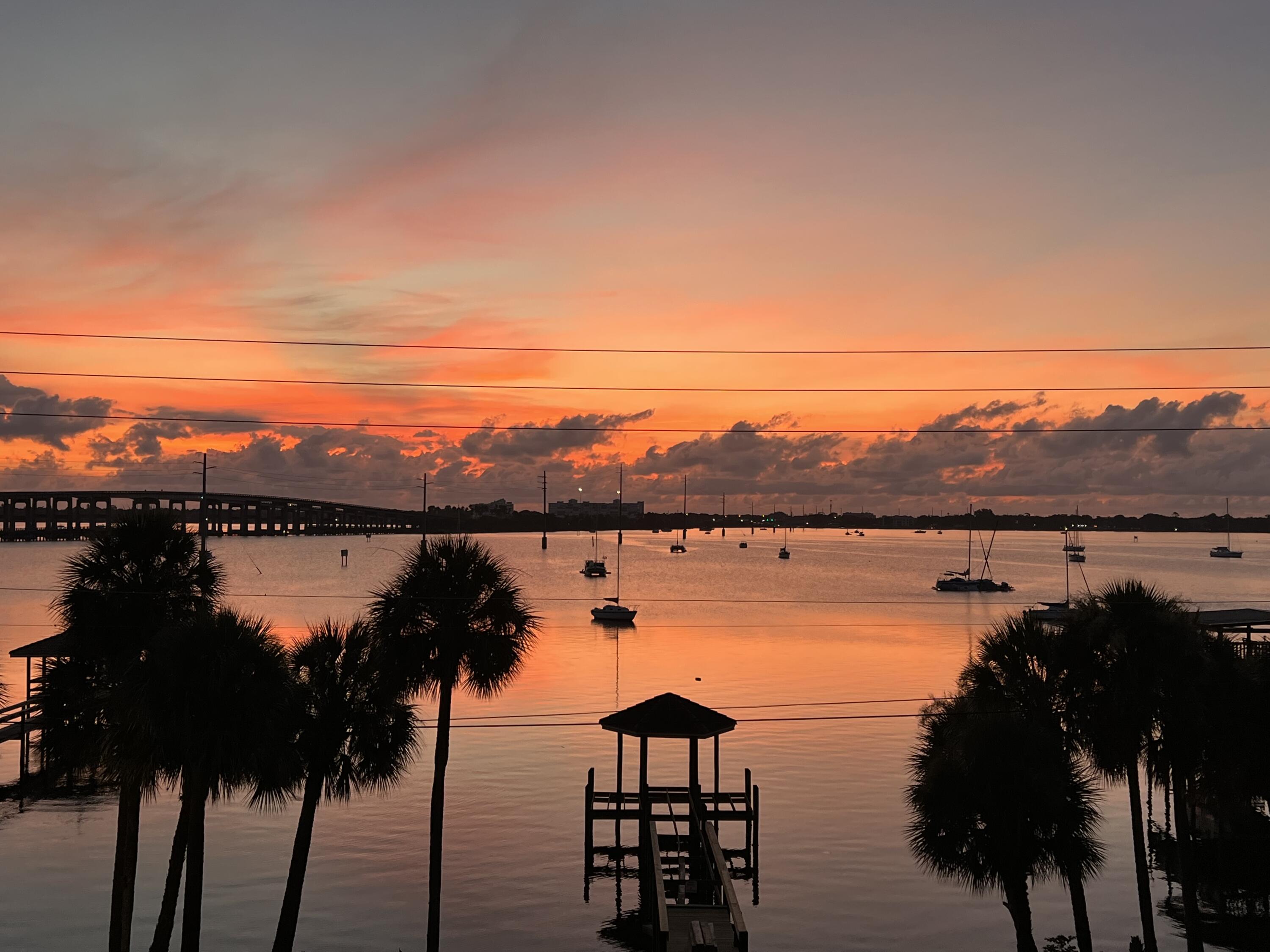29 Riverside Drive, Unit 201 Cocoa, FL 32922 - Photo 34 of 46 a view of a lake with a city