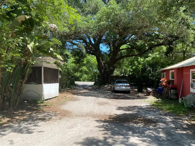 a view of a car in front of house