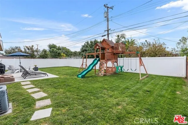 a view of a park with swings