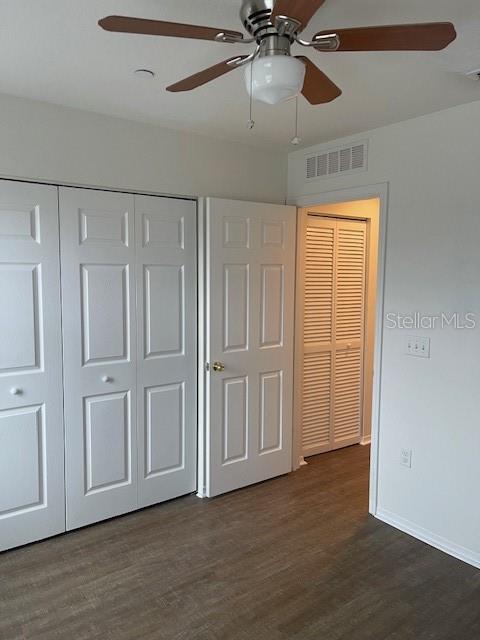 8893 White Sage Loop Lakewood Ranch, FL 34202 - Photo 11 of 14 a view of an empty room and chandelier fan