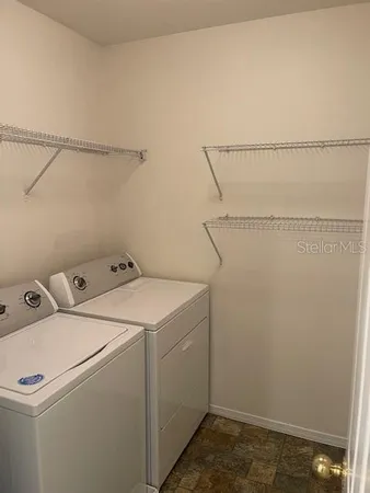 a bathroom with a sink toilet and vanity