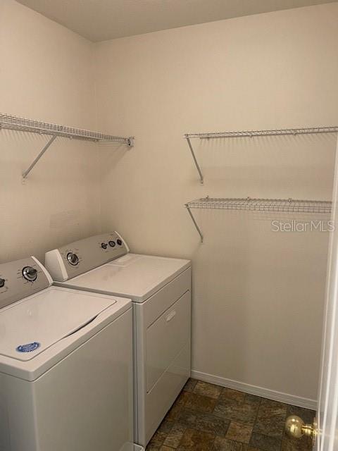 8893 White Sage Loop Lakewood Ranch, FL 34202 - Photo 13 of 14 a utility room with dryer and washer