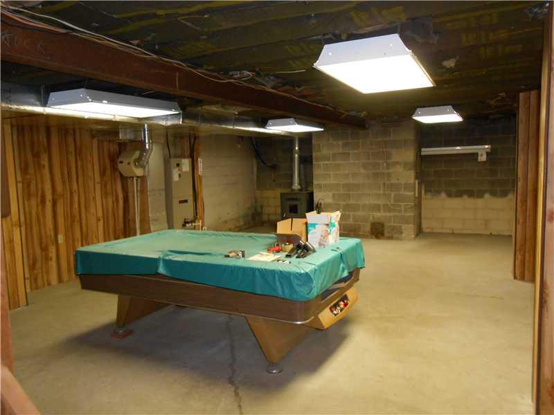 600 Waynesburg Road Washington, PA 15301 - Photo 8 of 12 Great Room. Basement gameroom with wood burner