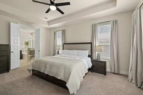 a bedroom with a bed and closet