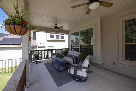 a balcony with furniture
