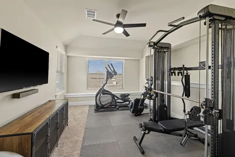 a view of a room with gym equipment