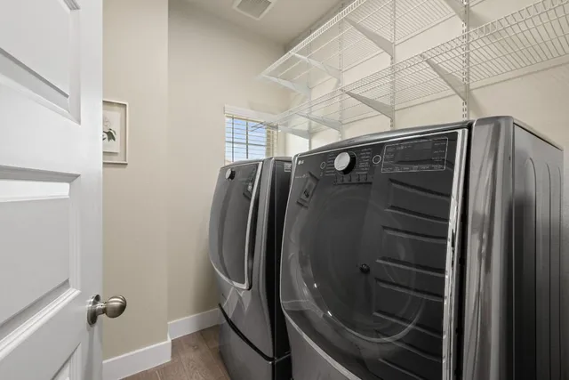 a bathroom with a shower and toilet