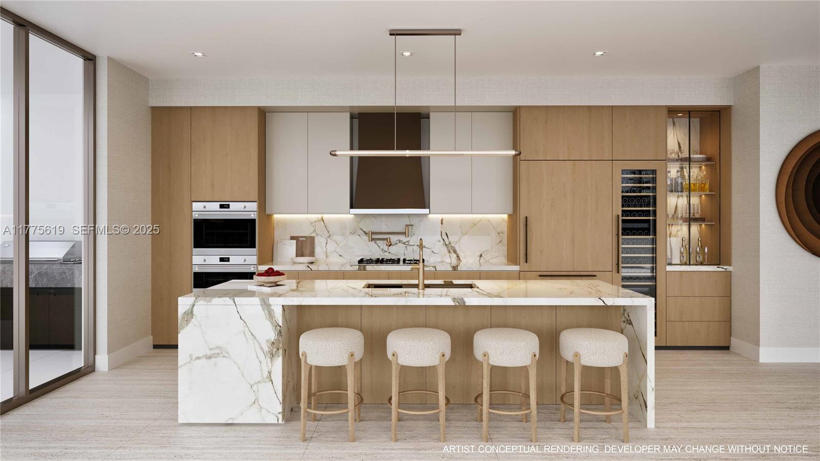 530 North Birch Road, Unit 601 Fort Lauderdale, FL 33304 - Photo 5 of 14 a kitchen with a dining table and chairs