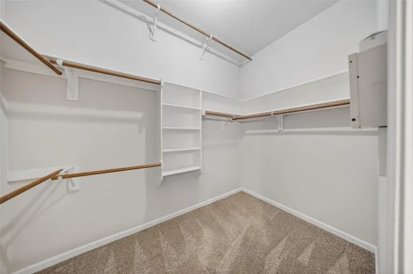 a view of an empty walk in closet