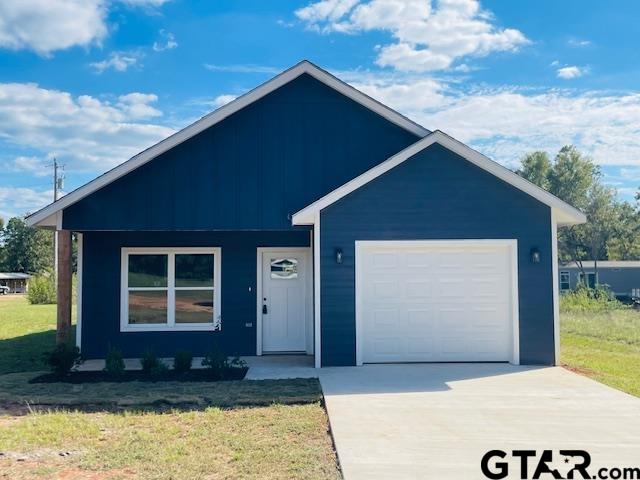 454 Crescent Bullard, TX 75757 - Photo 1 of 44 a house with trees in the background