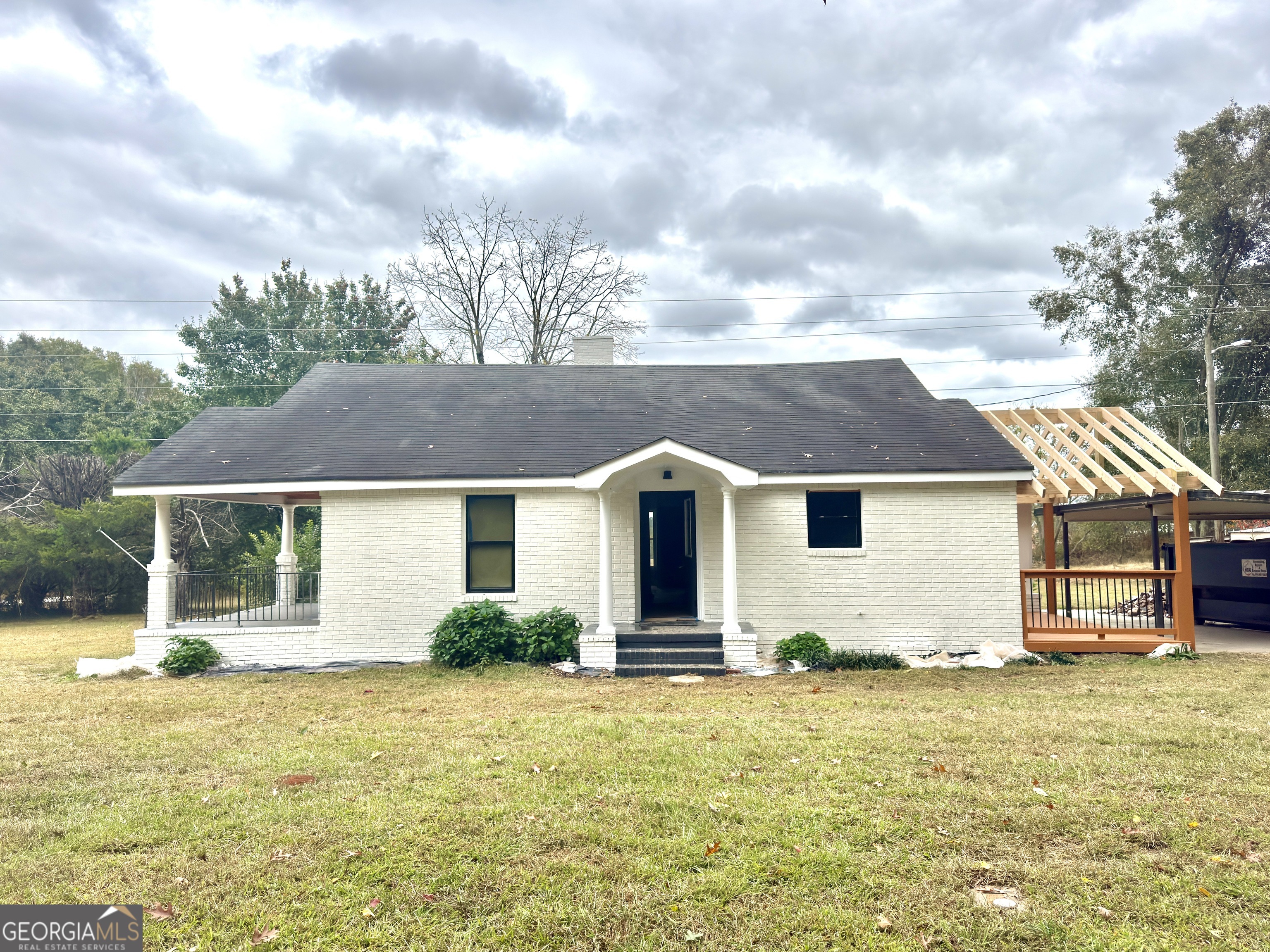 110 Fannin Road Griffin, GA 30223 - Photo 2 of 34 a front view of a house with garden