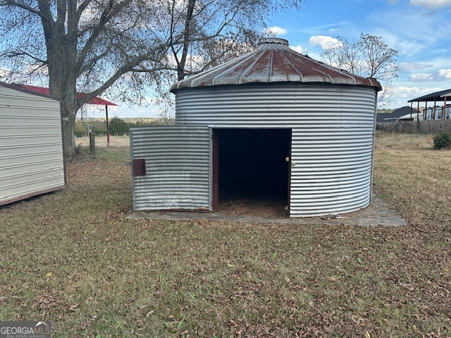 110 Fannin Road Griffin, GA 30223 - Photo 25 of 34 a view of a house with a yard and garage
