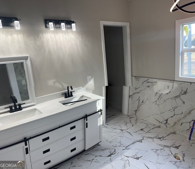 110 Fannin Road Griffin, GA 30223 - Photo 5 of 34 a bathroom with a sink vanity and mirror