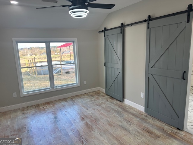 110 Fannin Road Griffin, GA 30223 - Photo 7 of 34 an empty room with wooden floor and window