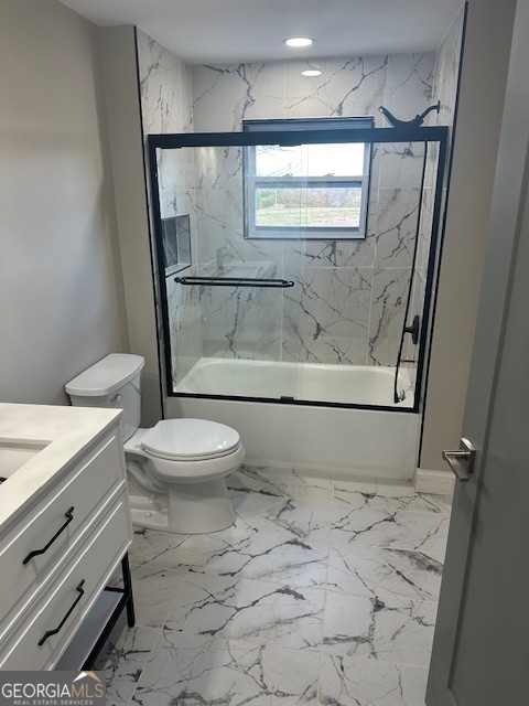 110 Fannin Road Griffin, GA 30223 - Photo 10 of 34 a bathroom with a toilet sink and shower