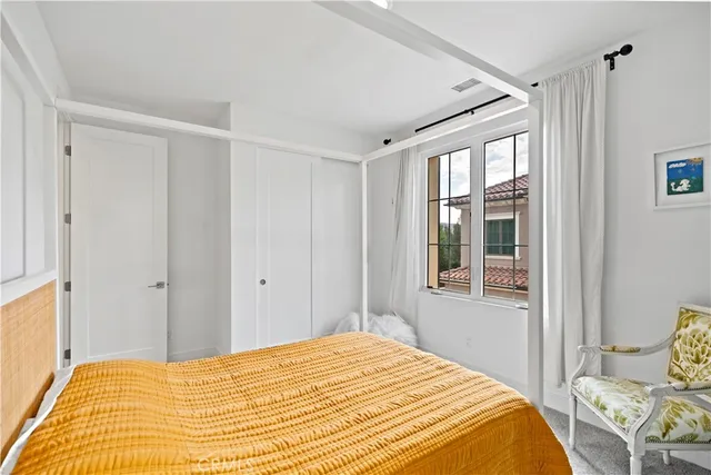 a bathroom with double sink and a mirror