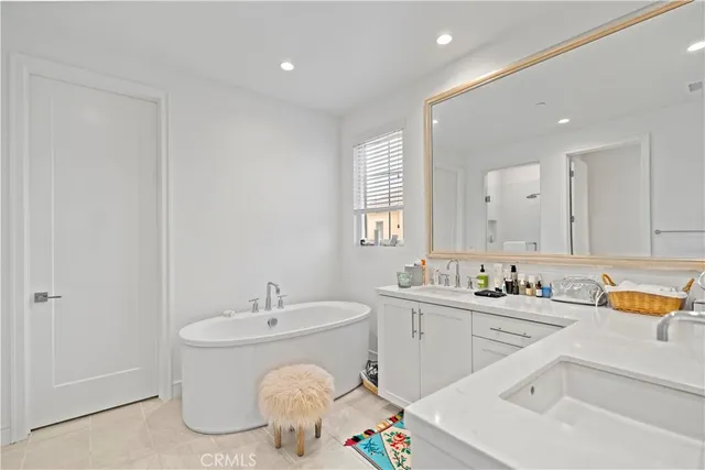 an aerial view of a house with garden space and street view