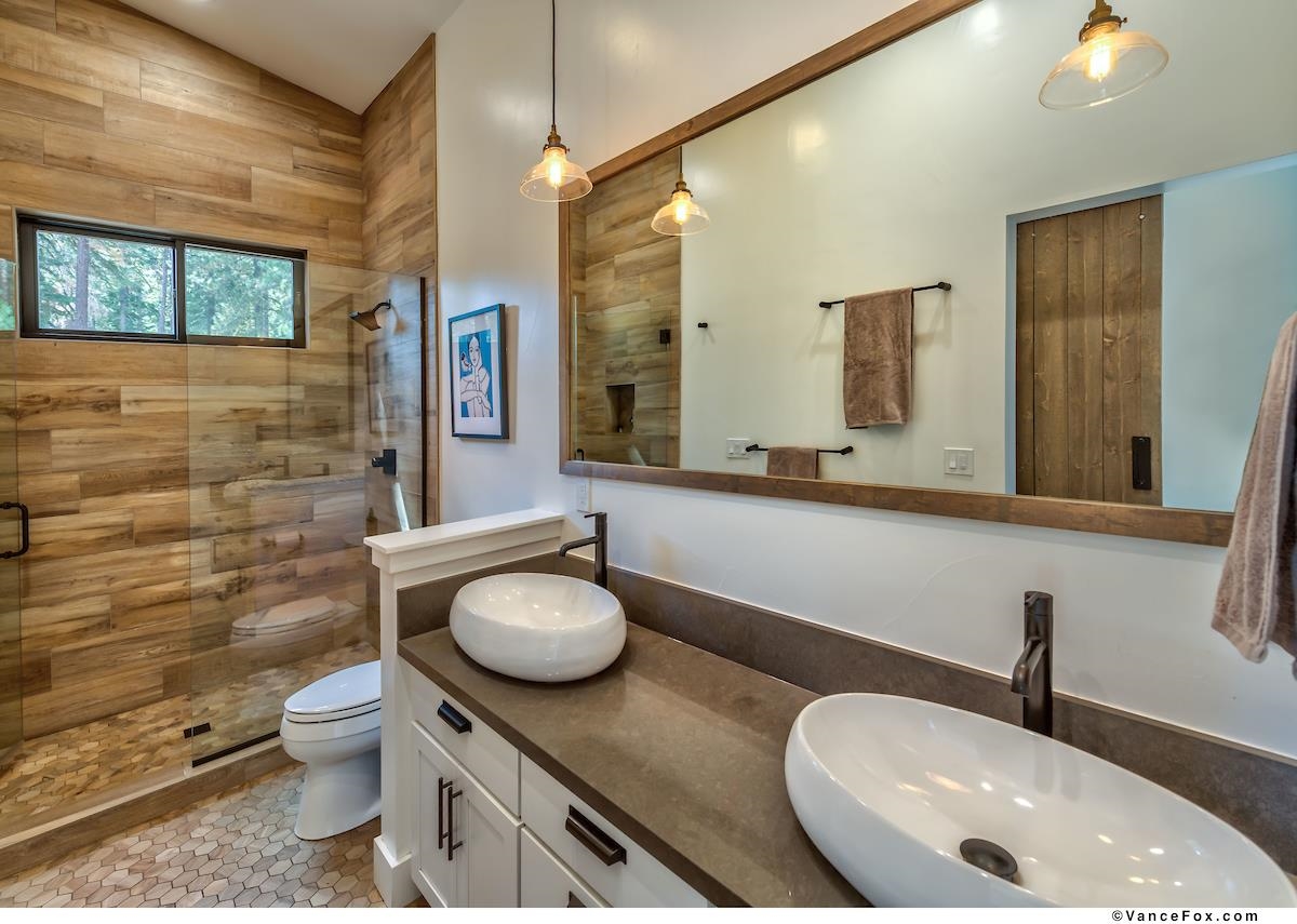 11964 Cavern Way Truckee, CA 96161 - Photo 13 of 21 a bathroom with a toilet sink and mirror