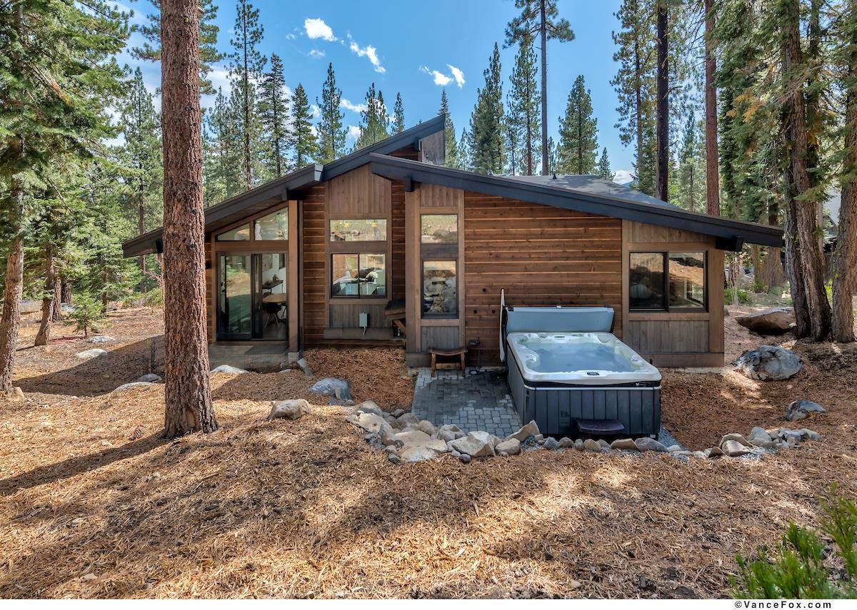 11964 Cavern Way Truckee, CA 96161 - Photo 20 of 21 a front view of a house with garden