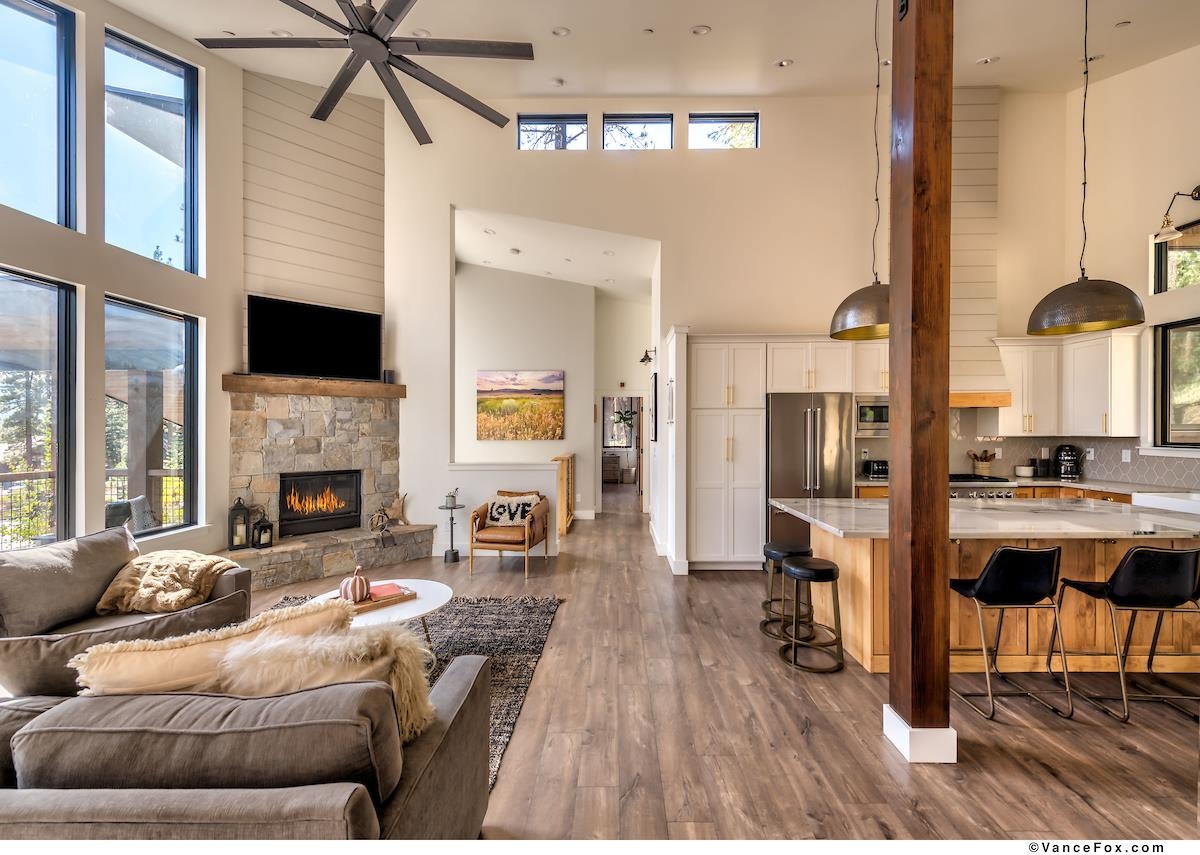 11964 Cavern Way Truckee, CA 96161 - Photo 7 of 21 a living room with furniture fireplace and a flat screen tv