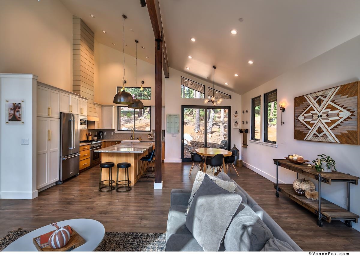 11964 Cavern Way Truckee, CA 96161 - Photo 8 of 21 a living room with fireplace furniture and a wooden floor