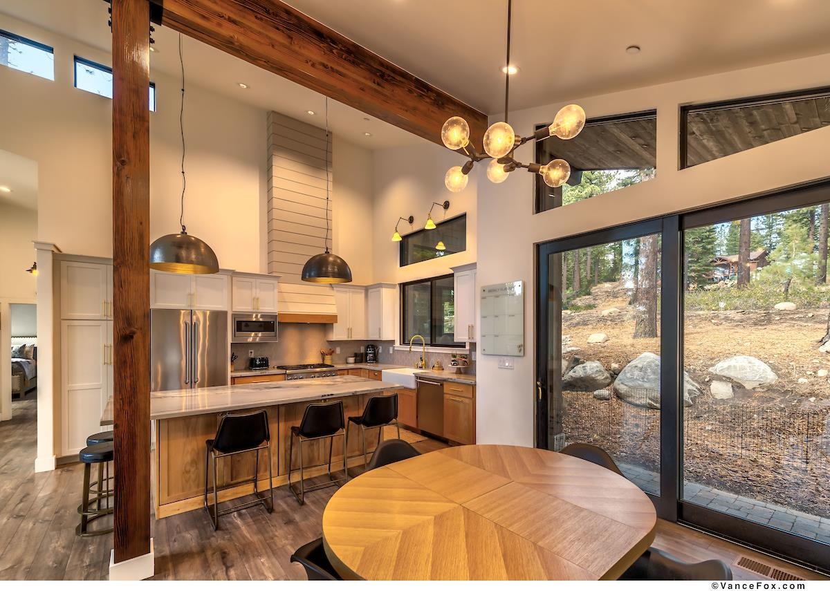 11964 Cavern Way Truckee, CA 96161 - Photo 10 of 21 a room with stainless steel appliances a chandelier open kitchen view