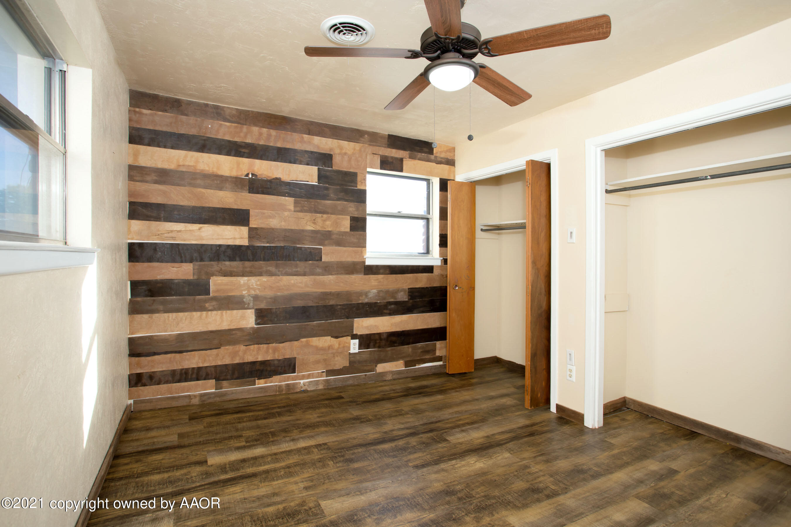 4313 Summit Circle Amarillo, TX 79109 - Photo 20 of 24 a view of walk in closet with empty racks