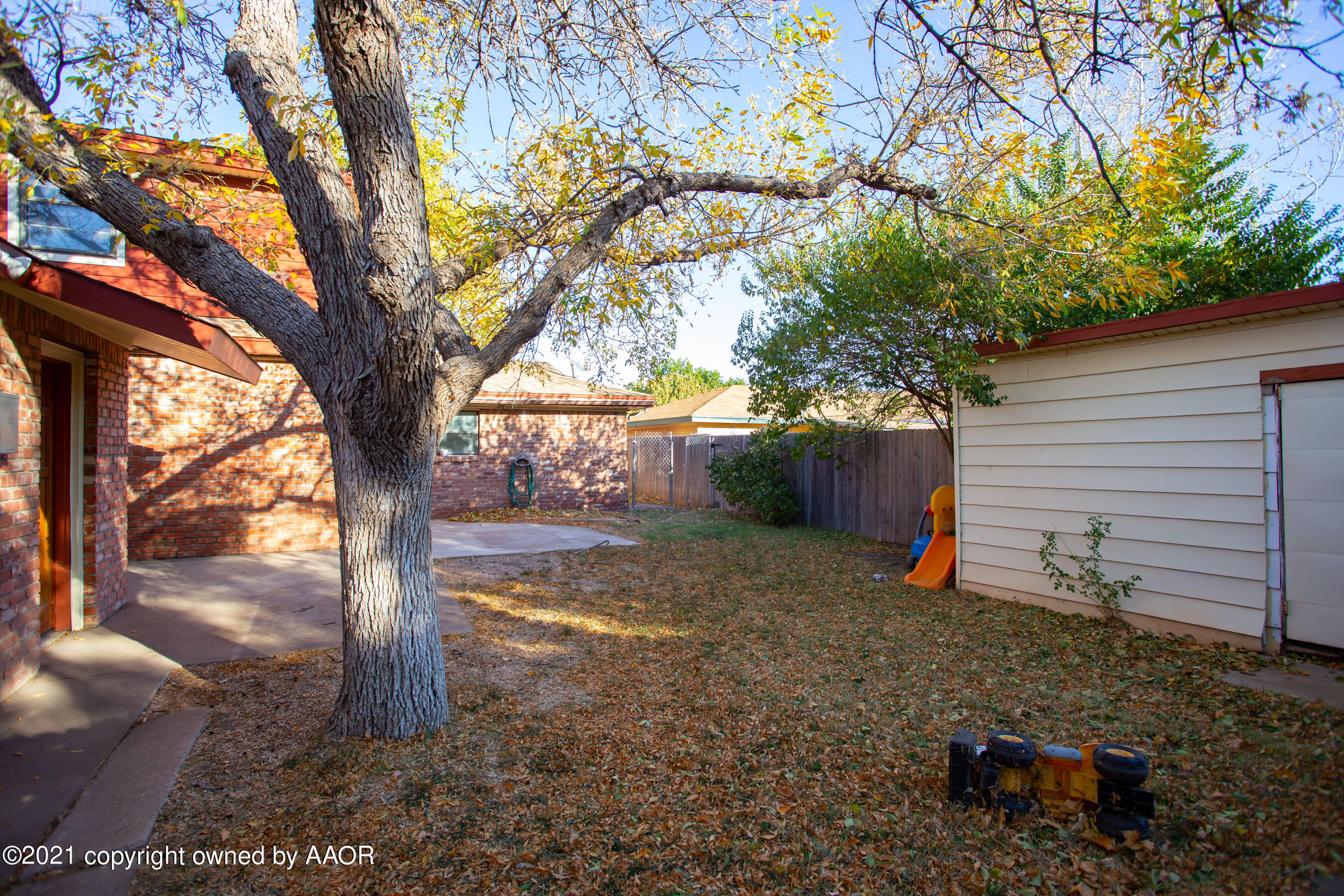 4313 Summit Circle Amarillo, TX 79109 - Photo 24 of 24 a backyard of a house with lots of green space