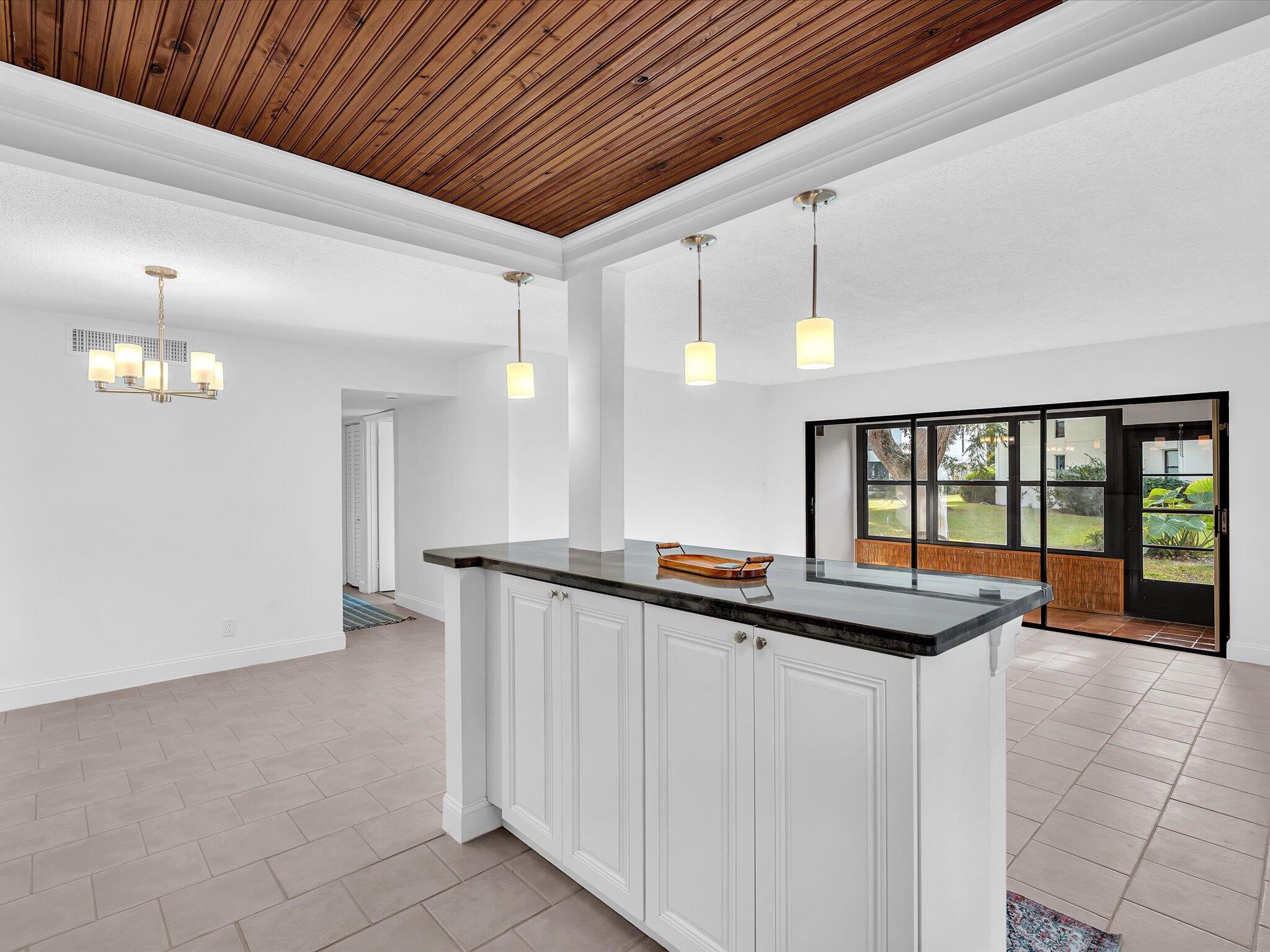 524 Osprey Drive, Unit 11B Delray Beach, FL 33444 - Photo 15 of 54 a view of a room with a large window