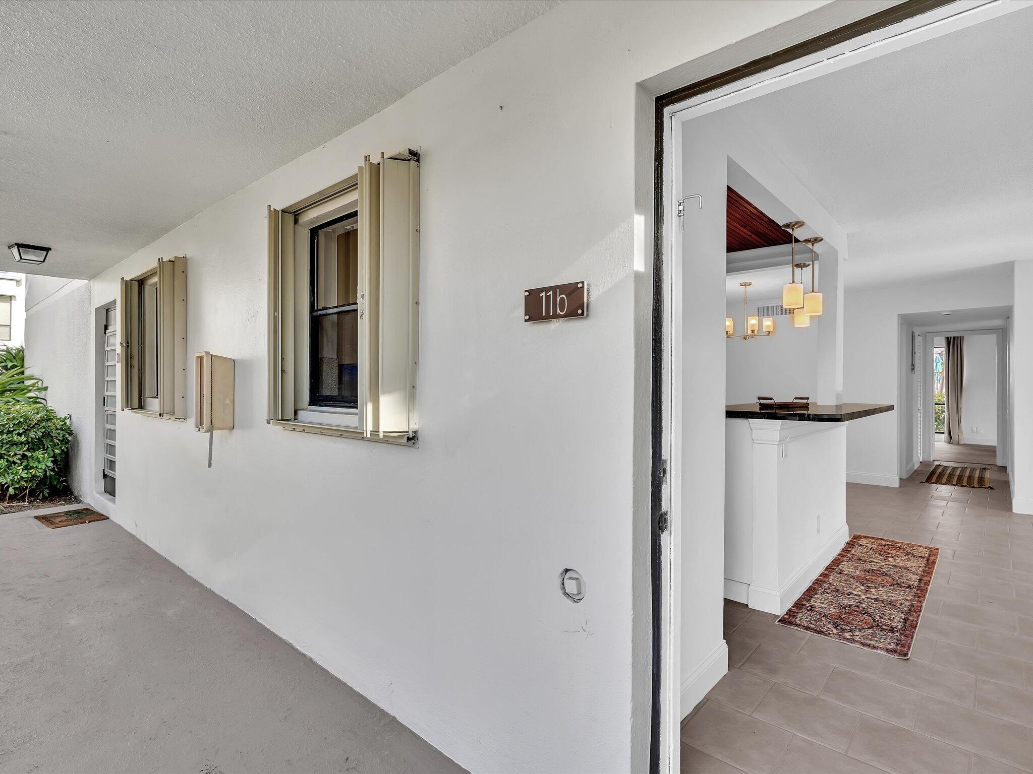 524 Osprey Drive, Unit 11B Delray Beach, FL 33444 - Photo 2 of 54 a view of livingroom with furniture and wooden floor