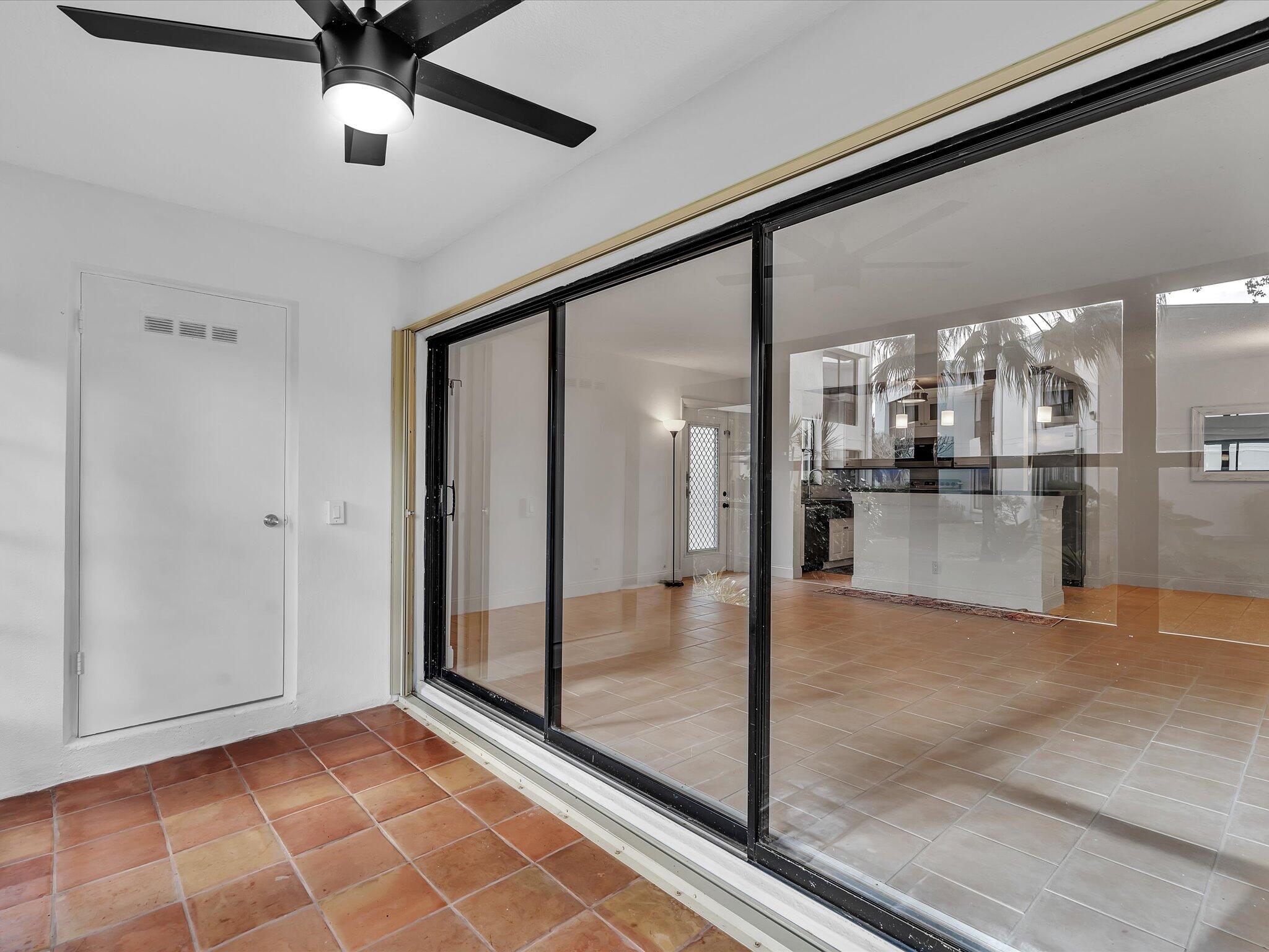 524 Osprey Drive, Unit 11B Delray Beach, FL 33444 - Photo 24 of 54 a view of a hallway
