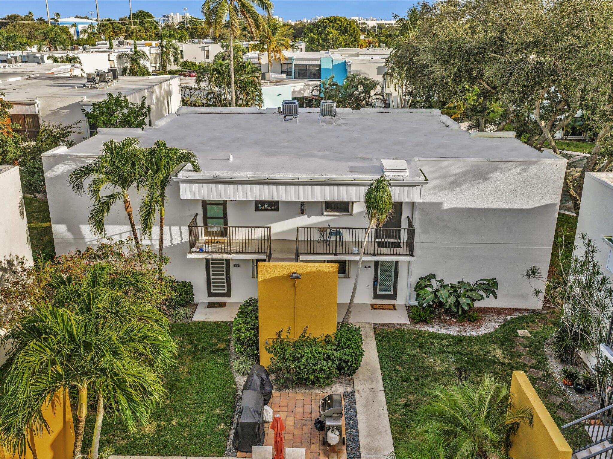 524 Osprey Drive, Unit 11B Delray Beach, FL 33444 - Photo 42 of 54 an aerial view of multiple house