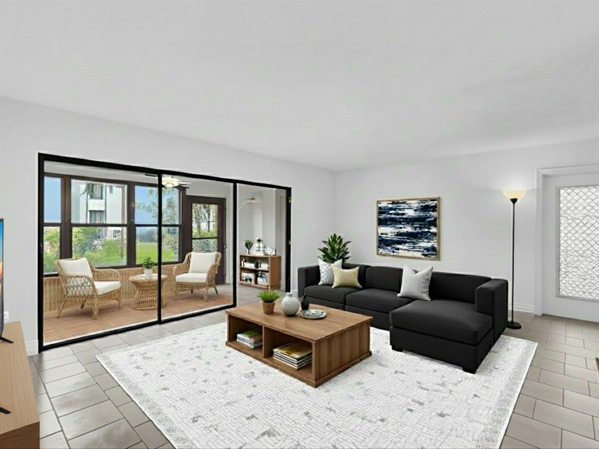 524 Osprey Drive, Unit 11B Delray Beach, FL 33444 - Photo 6 of 54 a living room with furniture and a floor to ceiling window