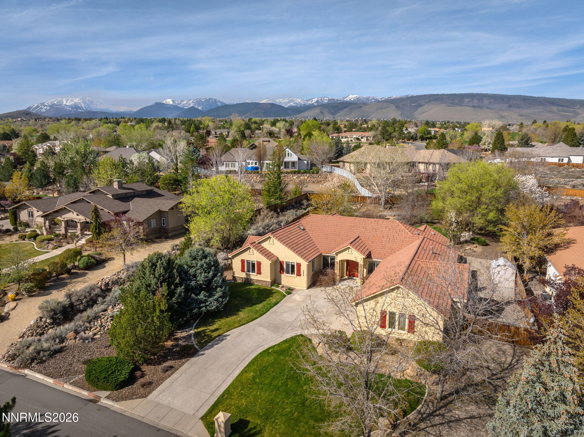 12635 Silver Wolf Road Reno, NV 89511 - Photo 2 of 48 an aerial view of residential houses with outdoor space and trees